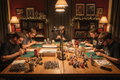 People building and painting miniatures